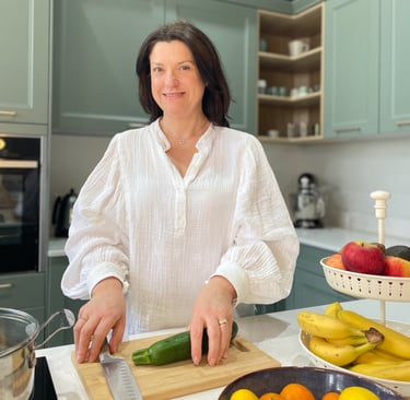 Louise Chamberlain in her kitchen. Nutrition coach, IBD support, gut health, menopause coach