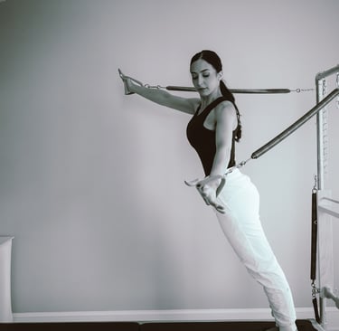 27 Pilates owner on a reformer photography