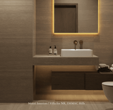 Bathroom mirror with integrated cove lighting, a white sink and dark wood vanity with underlighting
