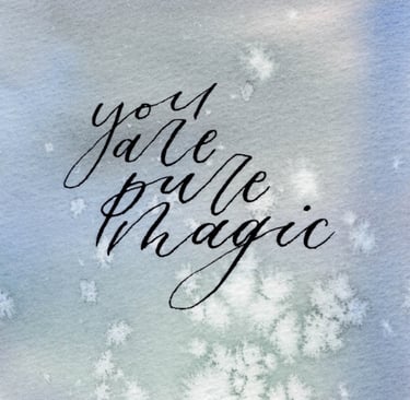 watercolor background of muted greens and blues with "you are pure magic" 