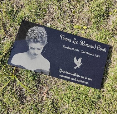 Custom lasered granite plaque for Verna Lee with a dove graphic.