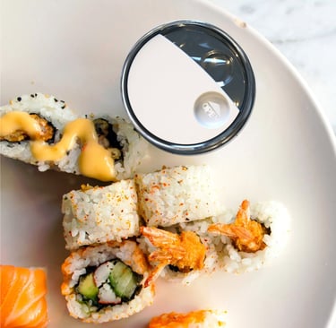 Photorealistic render of the disposable sauce container with secure cap, designed by Koorosh Shojaei