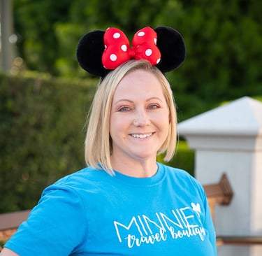 Amy Haskell pictured at Disney's Magic Kingdom® Park.