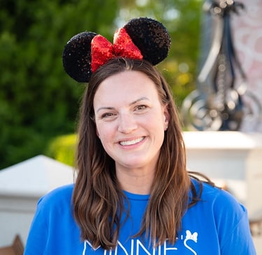 Kate Elliott pictured at Disney's Magic Kingdom® Park.
