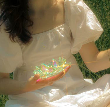 Creative cinematic detail image of model and prism in a park in northern virginia at golden hour