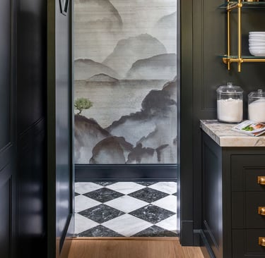 a kitchen with a black and white wallpaper and a black and white wallpaper