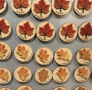 laser engraved and painted fall foliage souvenir magnets