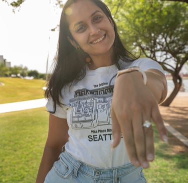woamn showing ring