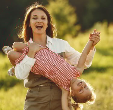 happy mom and child playing together