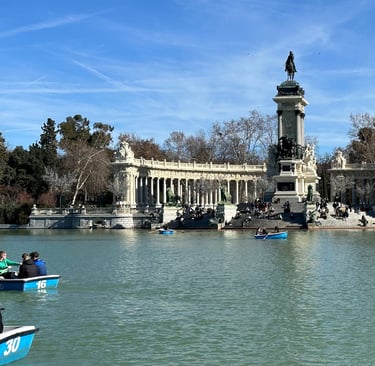 The monument to Alfonso XII behind a lake