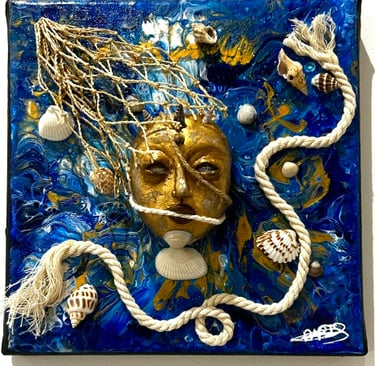 a blue and white tile with a face on it