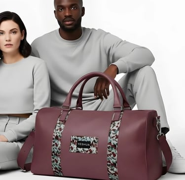 a man and woman sitting on a chair with a handbag