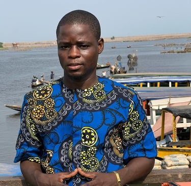 Dahomey African Tours Senior Guide and Tour Planner at Ganvie Stilt Village in Benin