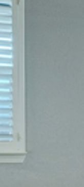 white shutters blue kitchen open space