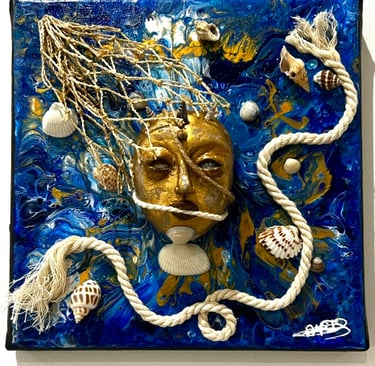 a blue and white tile with a face on it