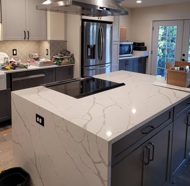 new kitchen with waterfall island edge
