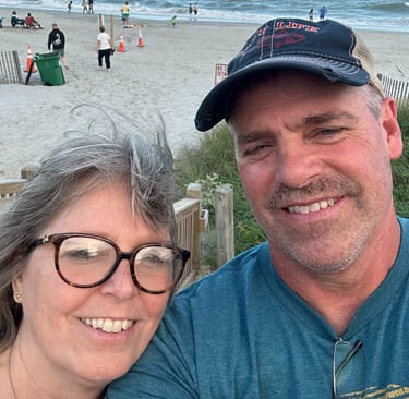 My wife Debbie and myself (Jim) at the beach celebrating family vacation together.