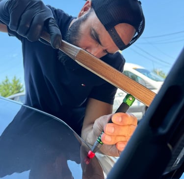 Our skilled technicians strive for customer satisfaction; Mrs. Sam expertly knocks the dent down.