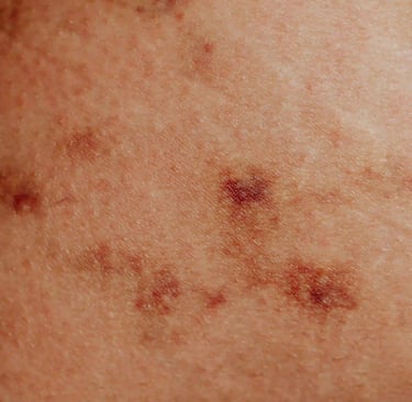 a close up of a person's leg with a tattoo on it
