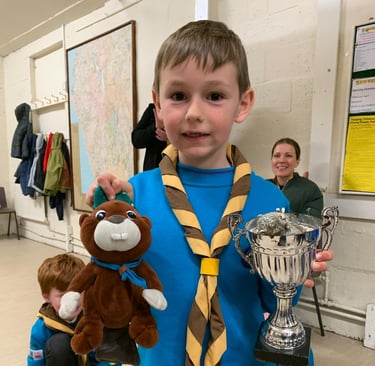 A happy 25th Allerton Beaver holding a winning cup