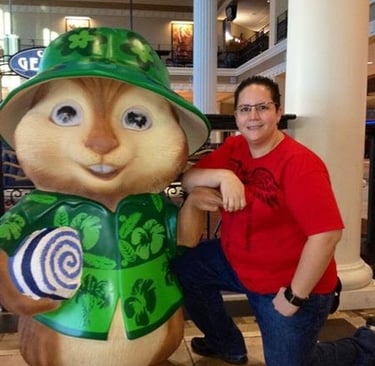 Elizabeth posing with a chipmunk