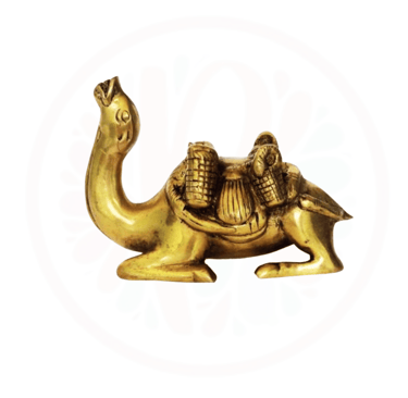 a gold colored camell with a camel in the middle of it