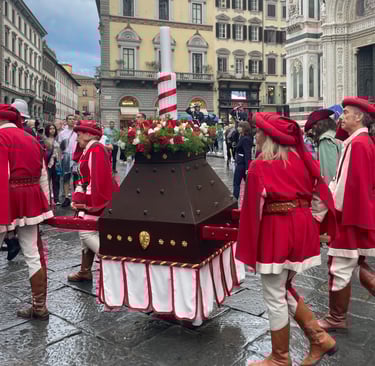 people in historic costume delivering the ceri (candle) to the Baptistry, Florence