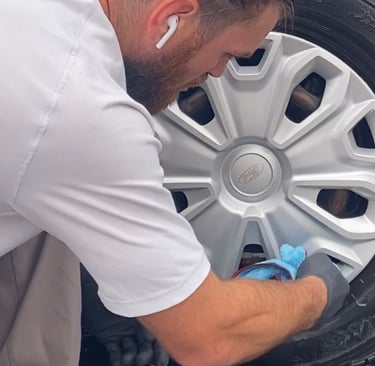 Jody cleaning a wheel