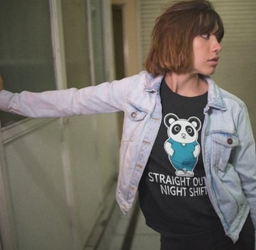 a woman in night shift nurse t-shirt