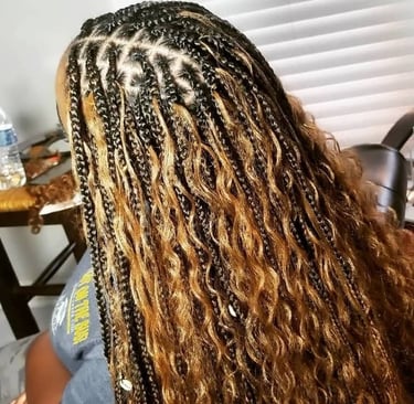 a woman with long bohobraids