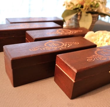 a bunch of wooden boxes with flowers in a vase