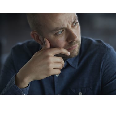 Man looking worried or fearful.