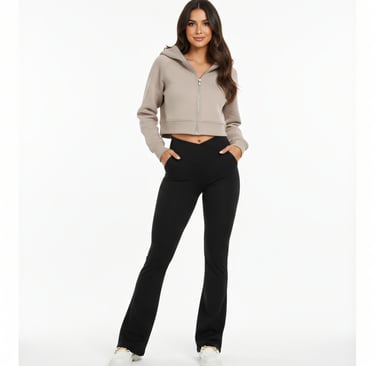 a woman in a cropped hoodie and legging