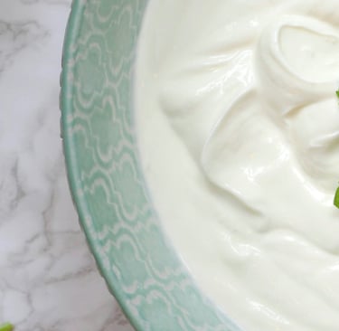 bowl of natural yoghurt with mint