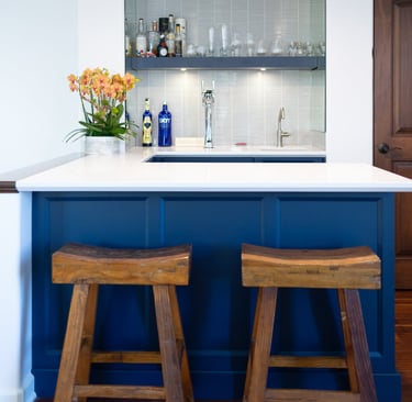 Wet bar transitional cabinets in blue paint