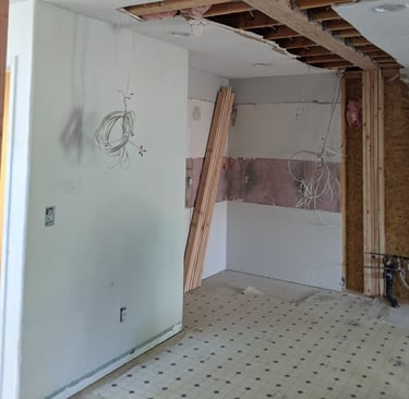 new beam in ceiling to replace walls and post