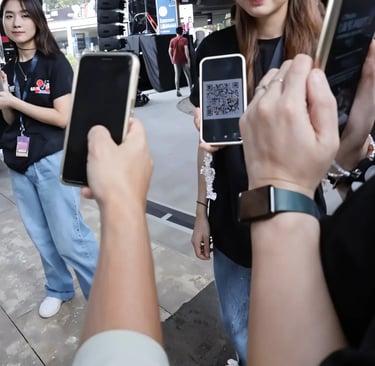 Visitor scanning QR code for event gamification digital passport registration in Jakarta