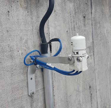  a wall-mounted rain gauge