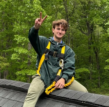 kyan sapko sitting on roof