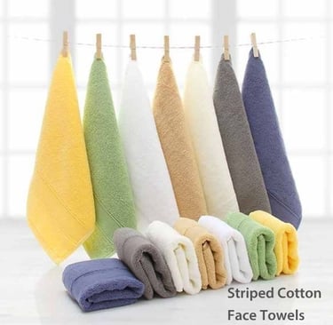 a variety of striped cotton face on a clothes line