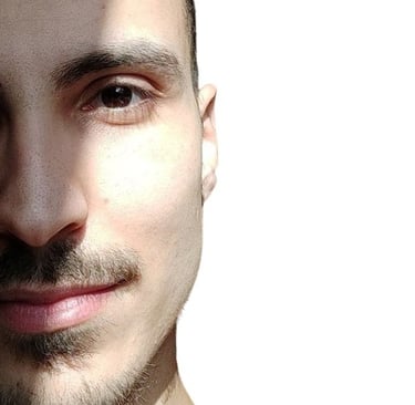 a man with a beard and a tie on his neck