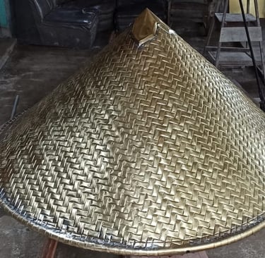 Patung Caping Kuningan