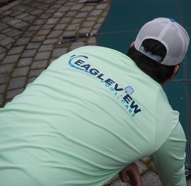 EagleView Pool Care technician performing expert pool maintenance in Connecticut