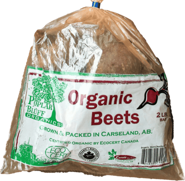 Clear plastic bag of beets with Poplar Bluff Organics logo