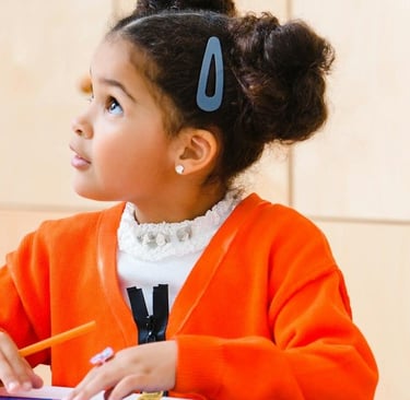 Little girl looking at teacher. Teaching careers in brief