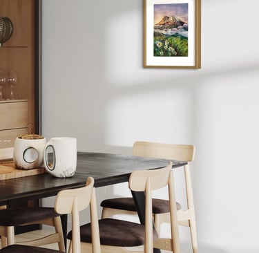 Angela Moiseieva original painting 'Sun-Kissed Peaks' above a dining table.