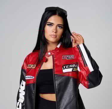 A model in a black and red jacket and shorts