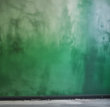 Modern office desk with architectural blueprints and moisture detection tools.