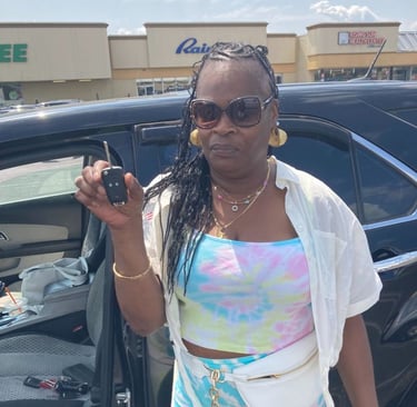 #Happy customer holding new spare remote key for 2011 Chevy Equinox in West Oak Lane, Philadelphia
