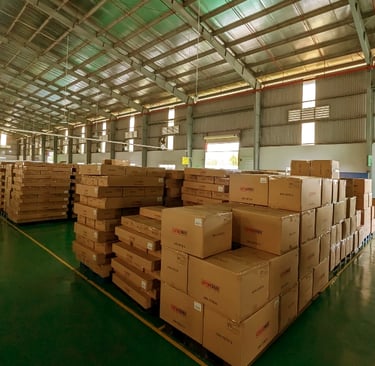 Finished goods warehouse with cartons ready for global shipping by King Fly.